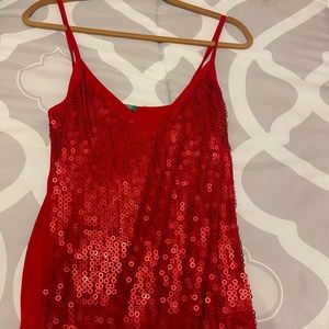 Red, sequence V-neck shirt. You can dress it up or dress it down